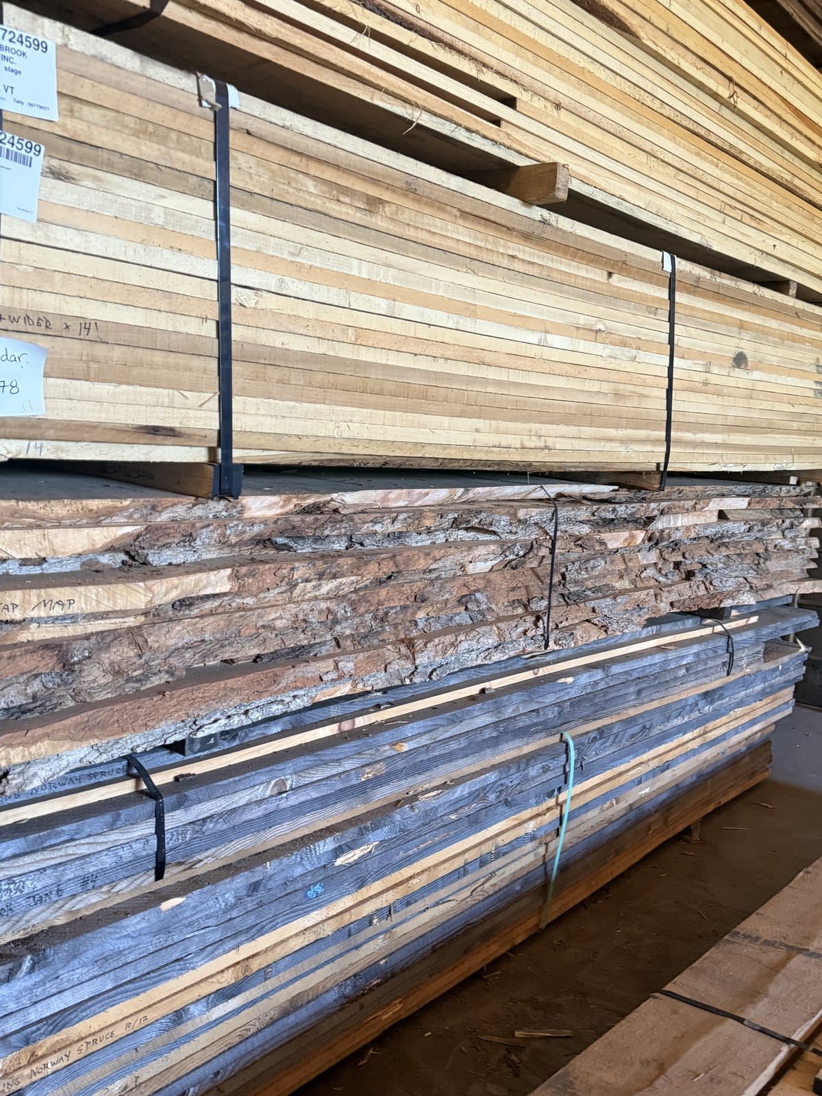 Live edge slabs on the rack at the shop