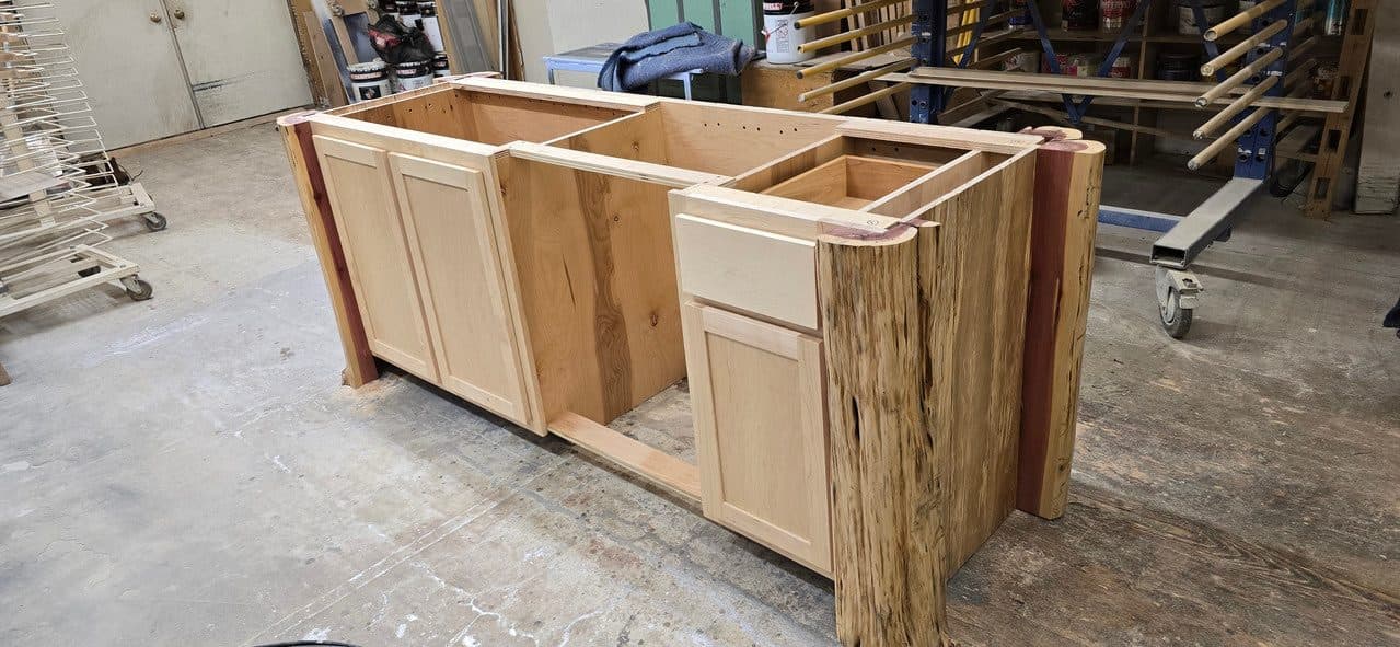 An island going together — spalted maple panels on natural cedar posts