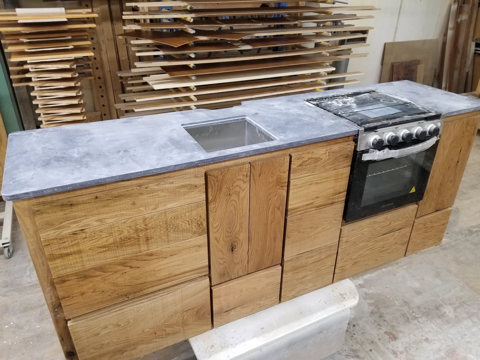 A kitchen run dry-fit in the shop before it ships